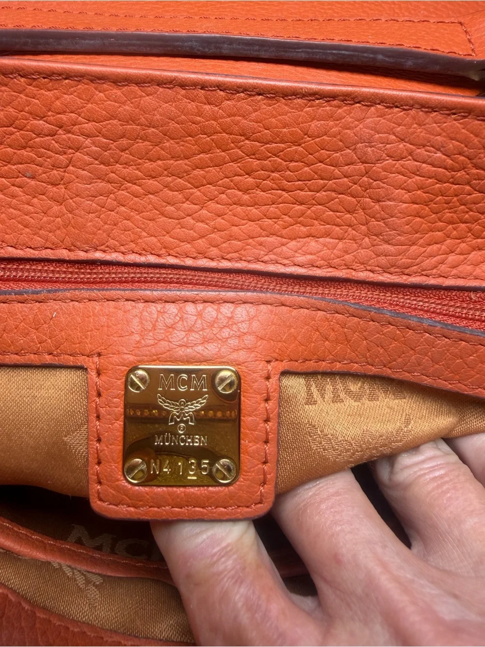 Structured Orange Leather Satchel with Top Handle and Crossbody Strap